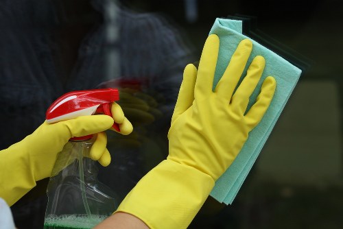 Carpet cleaning worker preparing safe equipment before starting a job
